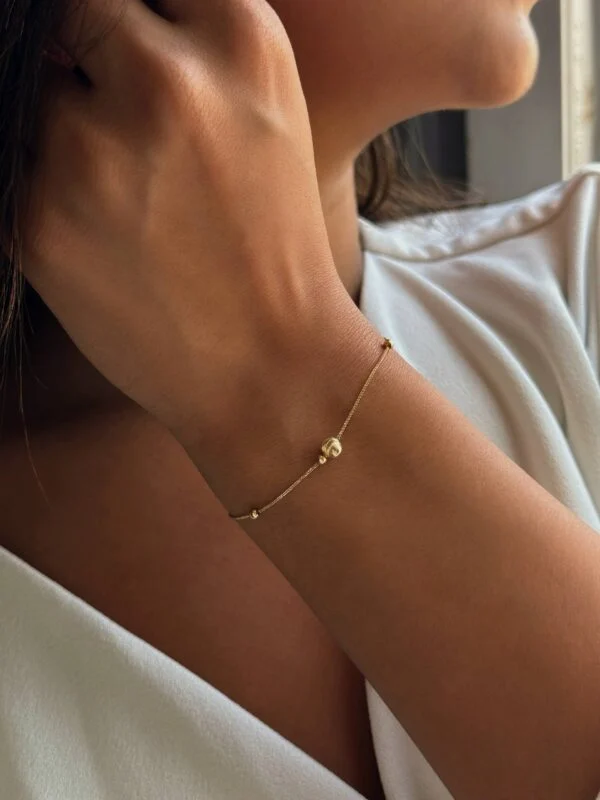 دستبند طلا سوپرلوکس طرح گوی با طراحی گرد و براق